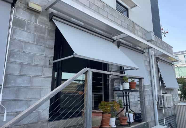 pivot arm awnings
