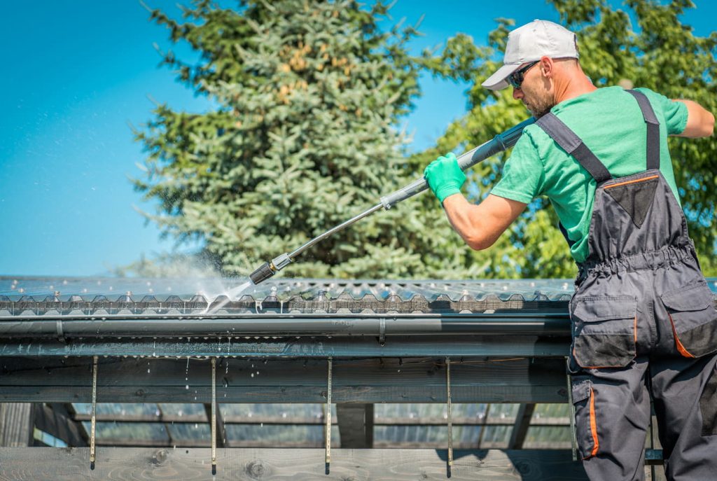 How Commercial Gutter Cleaning Keeps Your Building Strong